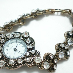 Swarovski taşlı eskitme bayan saati